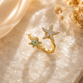 Bague Fleur Rotative – Acier Titane Doré